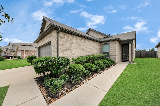 13003 Mills Creek Meadow Dr, Houston, TX 77070 - view of front of home with an attached garage and brick siding