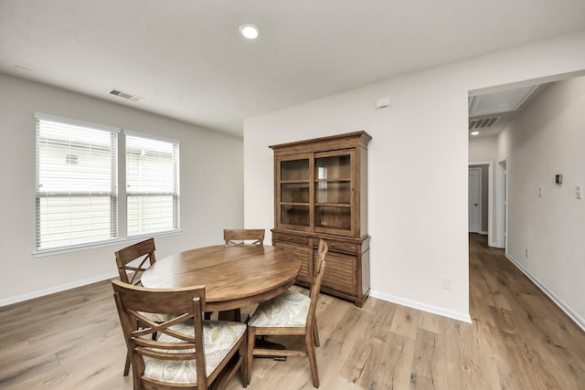 13003 Mills Creek Meadow Dr, Houston, TX 77070 - dining room featuring light wood-style floors, baseboards, recessed lighting, and attic access