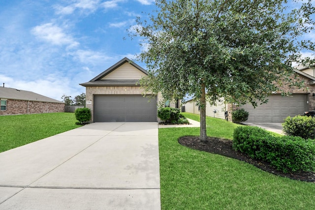 13003 Mills Creek Meadow Dr, Houston, TX 77070 - view of front facade featuring concrete driveway, a front yard, a garage, and brick siding
