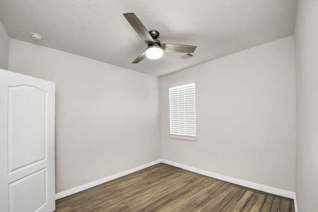 13003 Mills Creek Meadow Dr, Houston, TX 77070 - spare room with ceiling fan, wood finished floors, a smoke detector, and baseboards