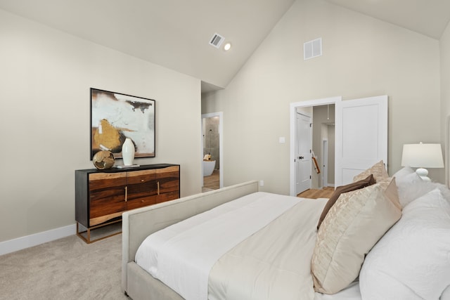 5811 Francis Oak Pl, Houston, TX 77091 - bedroom with high vaulted ceiling and light carpet