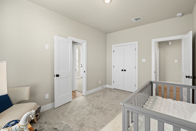 5811 Francis Oak Pl, Houston, TX 77091 - bedroom featuring light colored carpet and a closet