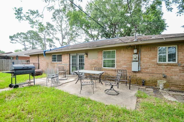 5914 Newquay St, Houston, TX 77085 - back of house with a patio area and brick siding