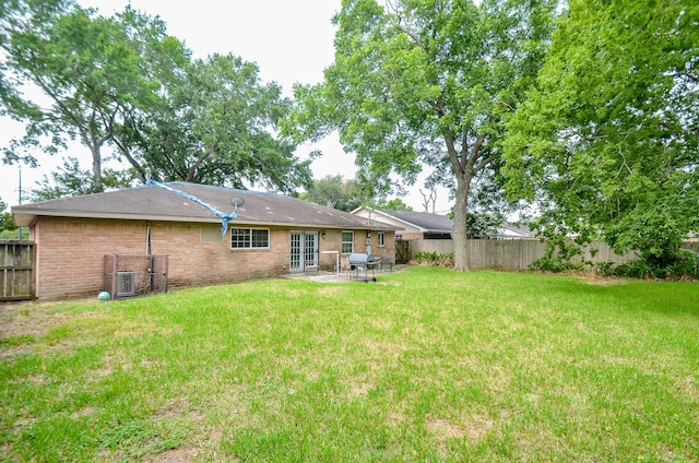 5914 Newquay St, Houston, TX 77085 - rear view of house with french doors, a patio, and cooling unit