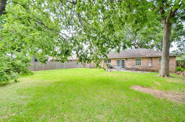 5914 Newquay St, Houston, TX 77085 - view of yard featuring a patio area
