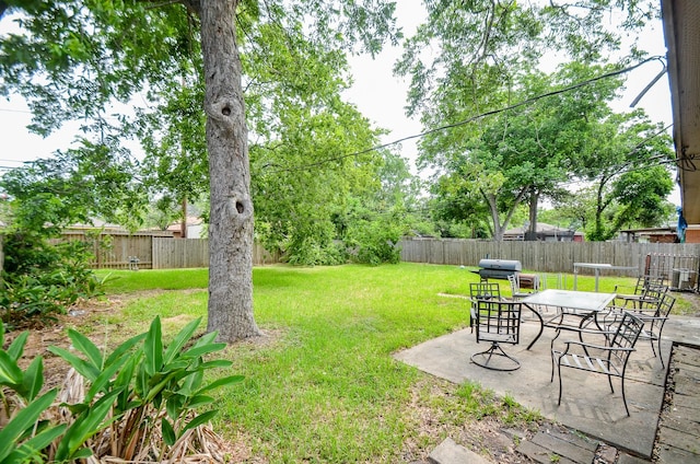 5914 Newquay St, Houston, TX 77085 - view of yard featuring a patio