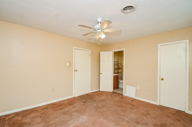 5914 Newquay St, Houston, TX 77085 - unfurnished bedroom with light carpet, baseboards, ensuite bath, and ceiling fan