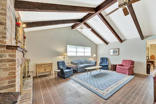 1705 E Texas Ave, Baytown, TX 77520 - living room featuring a ceiling fan, a fireplace, and baseboards