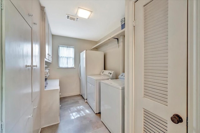 1705 E Texas Ave, Baytown, TX 77520 - laundry area featuring separate washer and dryer and baseboards