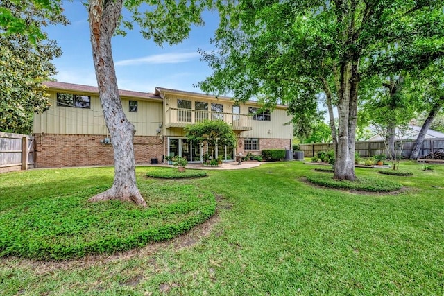 1705 E Texas Ave, Baytown, TX 77520 - view of yard featuring a balcony