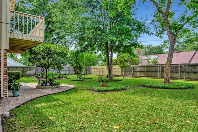 1705 E Texas Ave, Baytown, TX 77520 - view of yard with a patio area