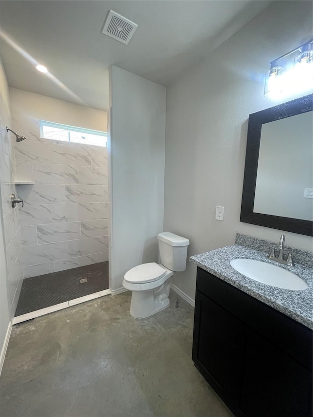 8 Greenway Dr, Trinity, TX 75862 - full bathroom featuring vanity, toilet, a shower stall, and concrete floors