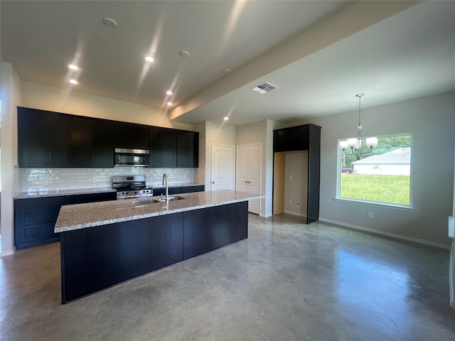 8 Greenway Dr, Trinity, TX 75862 - kitchen featuring appliances with stainless steel finishes, a sink, finished concrete floors, baseboards, and backsplash