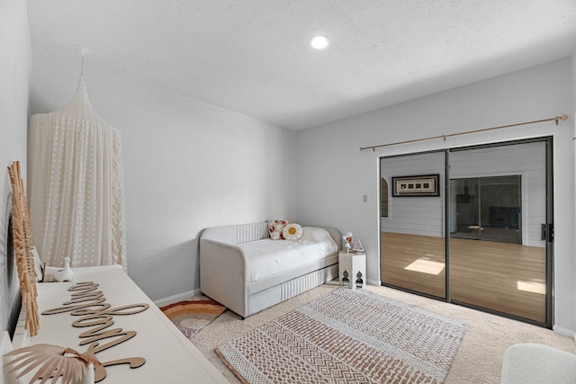 1915 Morton League Rd, Richmond, TX 77406 - bedroom with baseboards, recessed lighting, and carpet