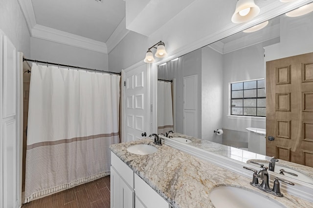 1915 Morton League Rd, Richmond, TX 77406 - full bath with double vanity, crown molding, curtained shower, and wood finished floors