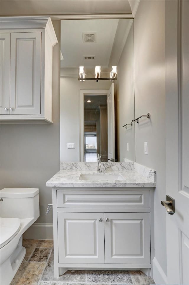 8304 Maple Ct, Bellaire, TX 77401 - half bath featuring baseboards, vanity, and toilet