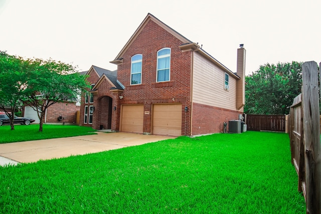 10407 Redwood Dr, Baytown, TX 77523 - traditional-style home with brick siding, an attached garage, driveway, central AC unit, and a chimney
