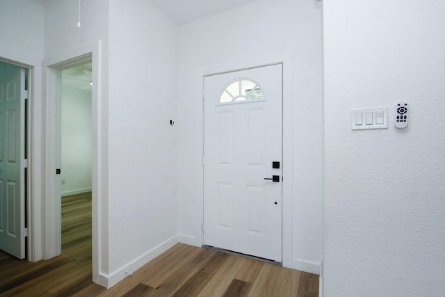 624 Pinewood Dr, Conroe, TX 77385 - entryway with wood finished floors and baseboards