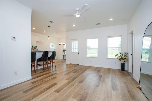 624 Pinewood Dr, Conroe, TX 77385 - foyer with a chandelier, recessed lighting, light wood finished floors, a ceiling fan, and baseboards