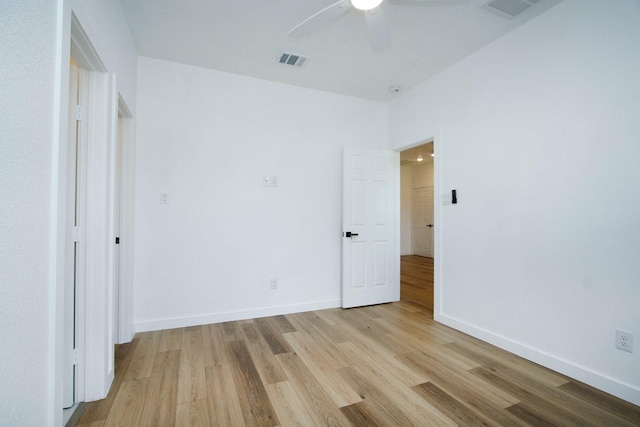 624 Pinewood Dr, Conroe, TX 77385 - unfurnished bedroom with light wood finished floors, baseboards, and ceiling fan