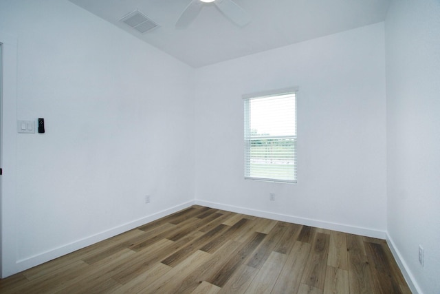 624 Pinewood Dr, Conroe, TX 77385 - empty room featuring wood finished floors, ceiling fan, and baseboards