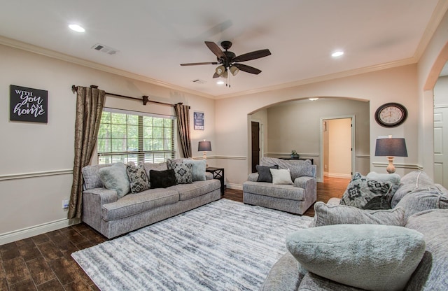 9107 Black Buck Ln, Conroe, TX 77303 - living area with arched walkways, ceiling fan, dark wood-style flooring, baseboards, and ornamental molding