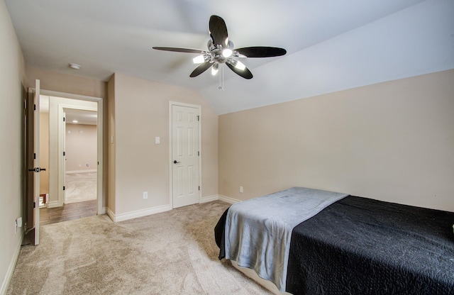 9107 Black Buck Ln, Conroe, TX 77303 - carpeted bedroom with baseboards and ceiling fan