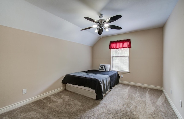 9107 Black Buck Ln, Conroe, TX 77303 - carpeted bedroom with baseboards, vaulted ceiling, and ceiling fan