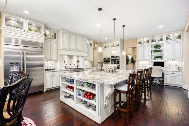 2803 Chester Knoll Ct, Katy, TX 77494 - kitchen featuring open shelves, appliances with stainless steel finishes, tasteful backsplash, a sink, and white cabinetry