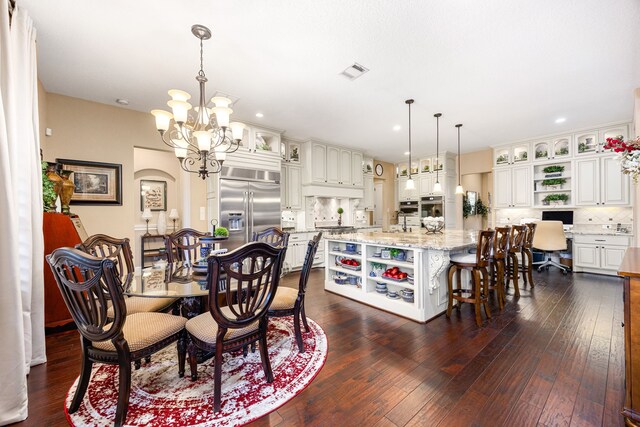 2803 Chester Knoll Ct, Katy, TX 77494 - dining space featuring a chandelier, recessed lighting, dark wood-style flooring, and an office area