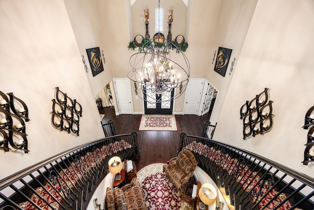 2803 Chester Knoll Ct, Katy, TX 77494 - foyer featuring a high ceiling, a chandelier, dark wood-style floors, stairway, and baseboards