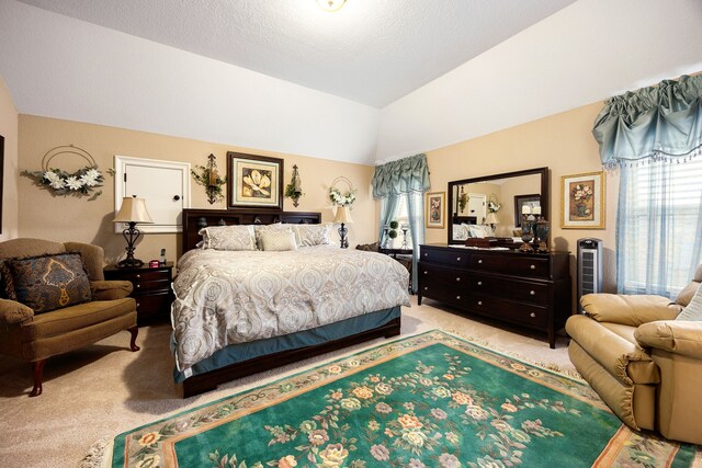 2803 Chester Knoll Ct, Katy, TX 77494 - bedroom with light colored carpet, multiple windows, and lofted ceiling