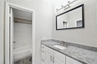 9707 Richmond Ave Unit 3, Houston, TX 77042 - full bath with vanity, toilet, and a shower