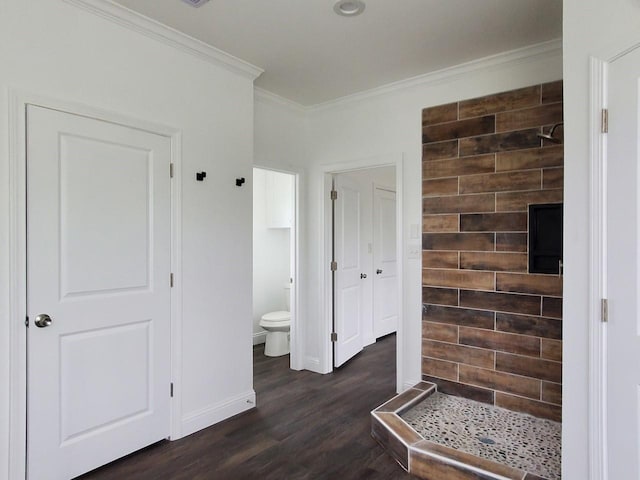 2615 Campbell St, Houston, TX 77026 - bathroom with a stall shower, wood finished floors, ornamental molding, toilet, and baseboards