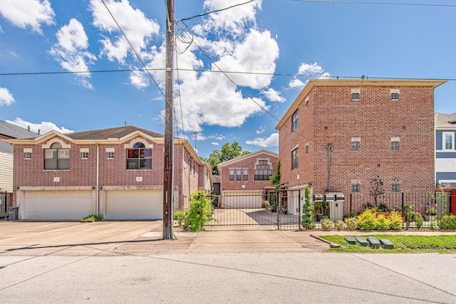 5229 Larkin St, Houston, TX 77007 - view of street featuring a gate and a gated entry