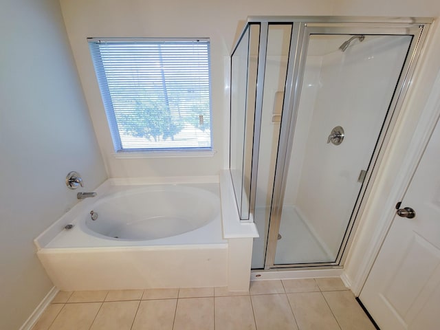6135 Shelbourne Park Ln, Houston, TX 77084 - full bathroom with tile patterned floors, a shower stall, and a garden tub
