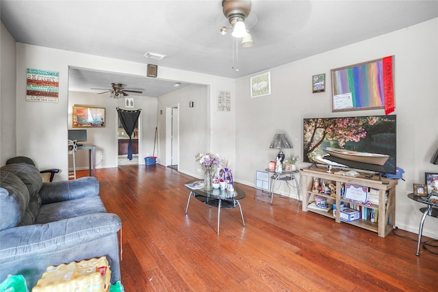 3603 Providence St, Houston, TX 77020 - living room featuring ceiling fan, wood finished floors, and baseboards