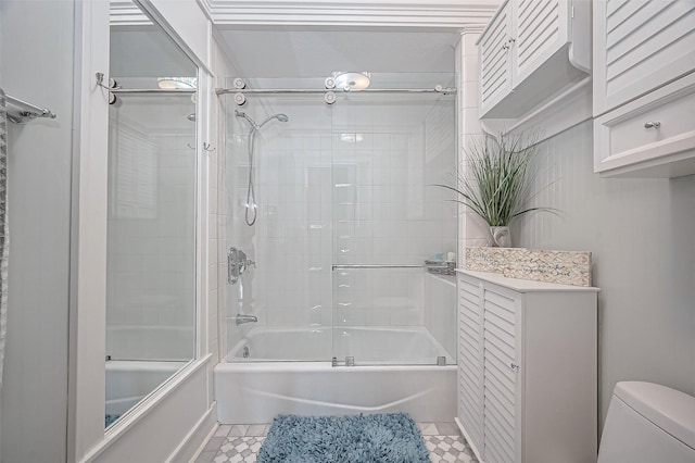 206 S Idaho St, La Porte, TX 77571 - bathroom with enclosed tub / shower combo, toilet, and tile patterned floors
