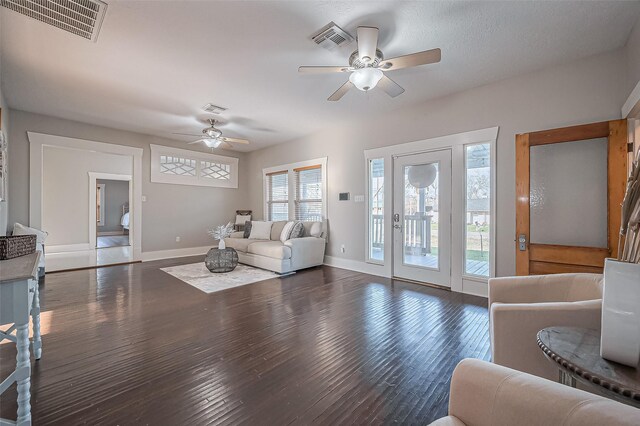 206 S Idaho St, La Porte, TX 77571 - living area featuring ceiling fan, baseboards, and wood finished floors