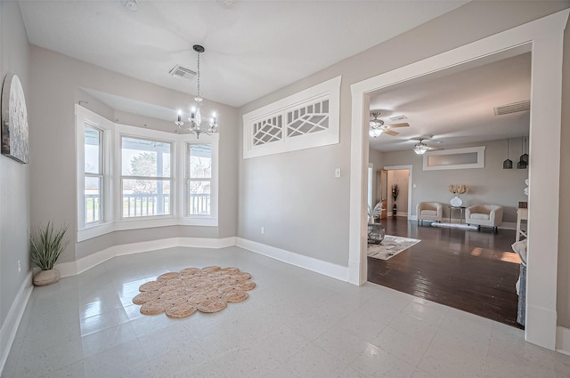 206 S Idaho St, La Porte, TX 77571 - unfurnished dining area featuring baseboards, a chandelier, and a ceiling fan