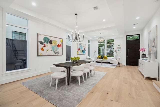 1203 Bomar St, Houston, TX 77006 - dining room with a chandelier, light wood-type flooring, baseboards, and recessed lighting