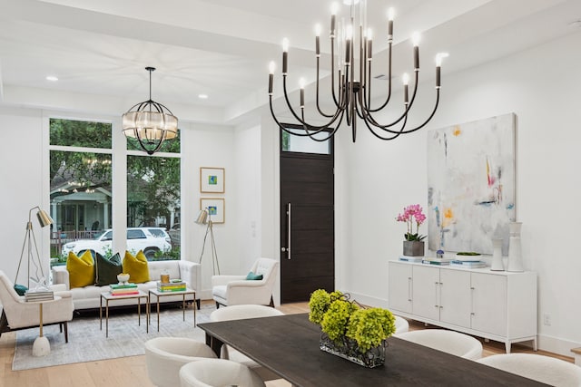1203 Bomar St, Houston, TX 77006 - living area with a chandelier, light wood-style floors, and recessed lighting