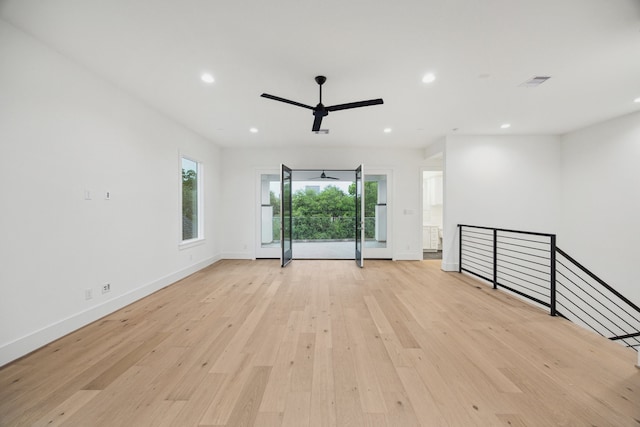 1203 Bomar St, Houston, TX 77006 - unfurnished room featuring light wood-style floors, recessed lighting, a ceiling fan, and baseboards