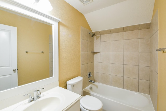 2123 Witham Park Ln, Fresno, TX 77545 - full bath featuring a textured wall, lofted ceiling, toilet, vanity, and  shower combination