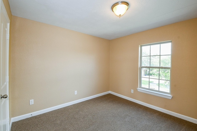 2123 Witham Park Ln, Fresno, TX 77545 - empty room with dark carpet and baseboards