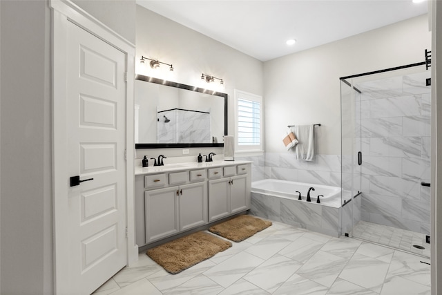 18631 Joyous Ln, Cypress, TX 77433 - full bathroom featuring double vanity, a bath, a marble finish shower, marble finish floors, and recessed lighting