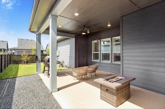 18631 Joyous Ln, Cypress, TX 77433 - view of patio / terrace with a fire pit and a ceiling fan