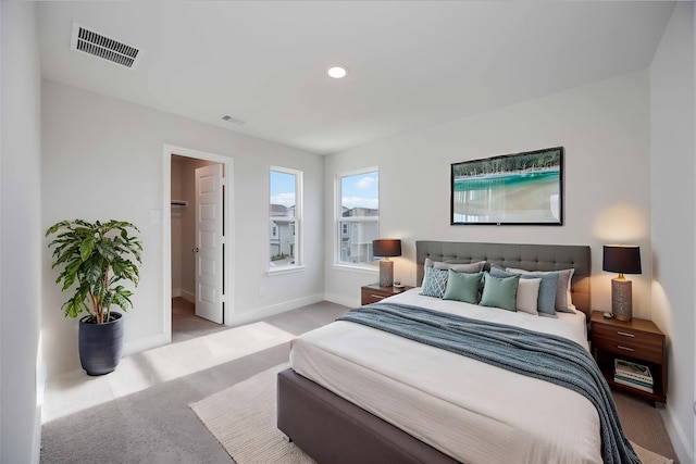13216 Opera Dr, Houston, TX 77047 - bedroom with carpet flooring, baseboards, recessed lighting, and a spacious closet