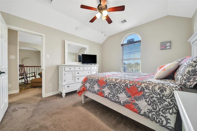 3610 Rock Daisy Dr, Spring, TX 77386 - carpeted bedroom featuring lofted ceiling, baseboards, ceiling fan, and arched walkways