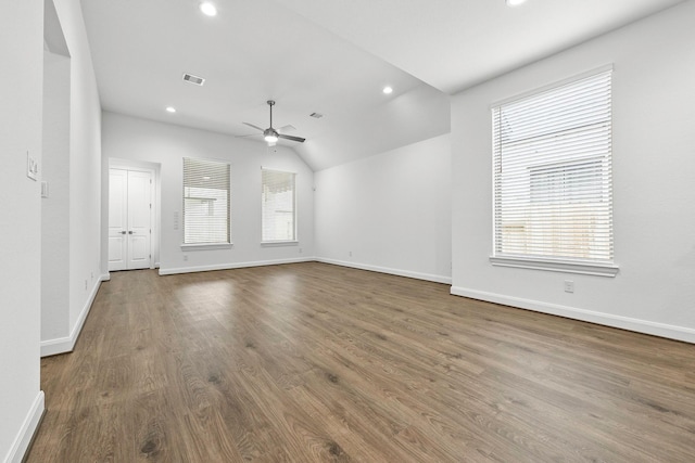 836 Laguna Green Ln, Katy, TX 77493 - unfurnished living room with ceiling fan, wood finished floors, vaulted ceiling, and recessed lighting